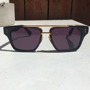 DITA gold and black sunglasses